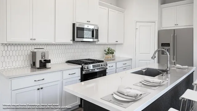 a view of a dining room with furniture wooden floor and a rug