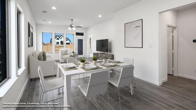 a bedroom with a bed and a potted plant