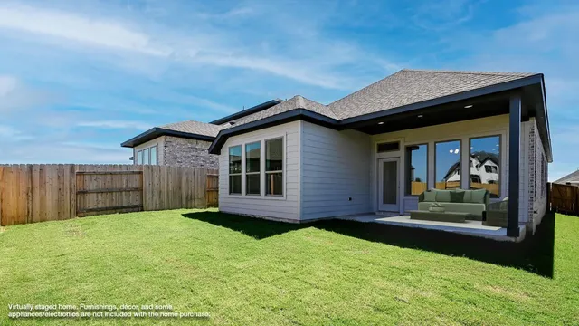 a kitchen with white cabinets a sink dishwasher and a stove with wooden floor