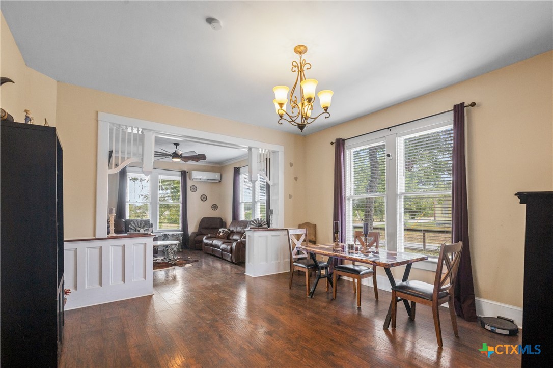 612 Wilbern Street Runge, TX 78151 - Photo 23 of 33 a view of a dining room with furniture window and wooden floor