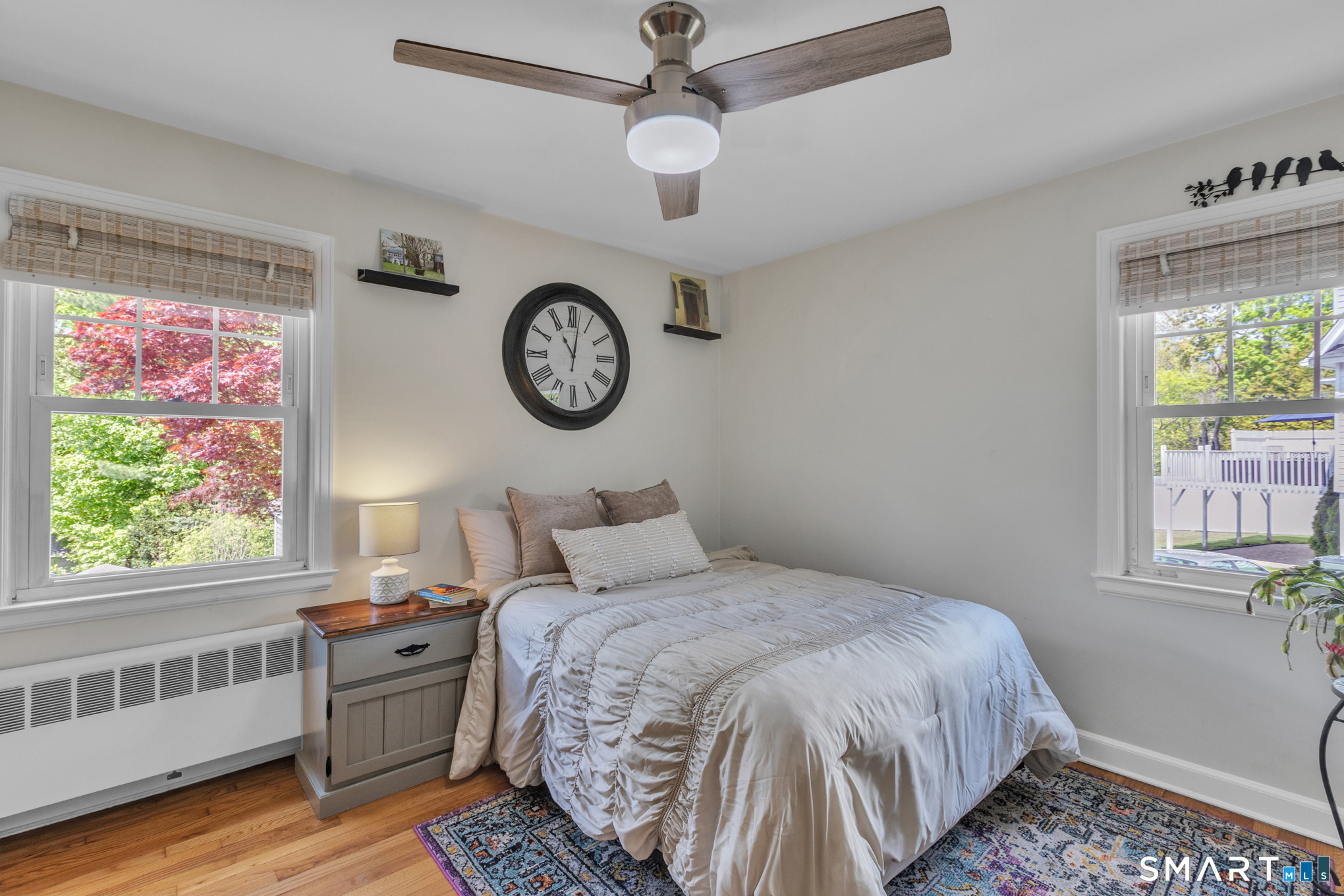 597 Wolcott Hill Road Wethersfield, CT 06109 - Photo 27 of 35 a bedroom with a bed and a window