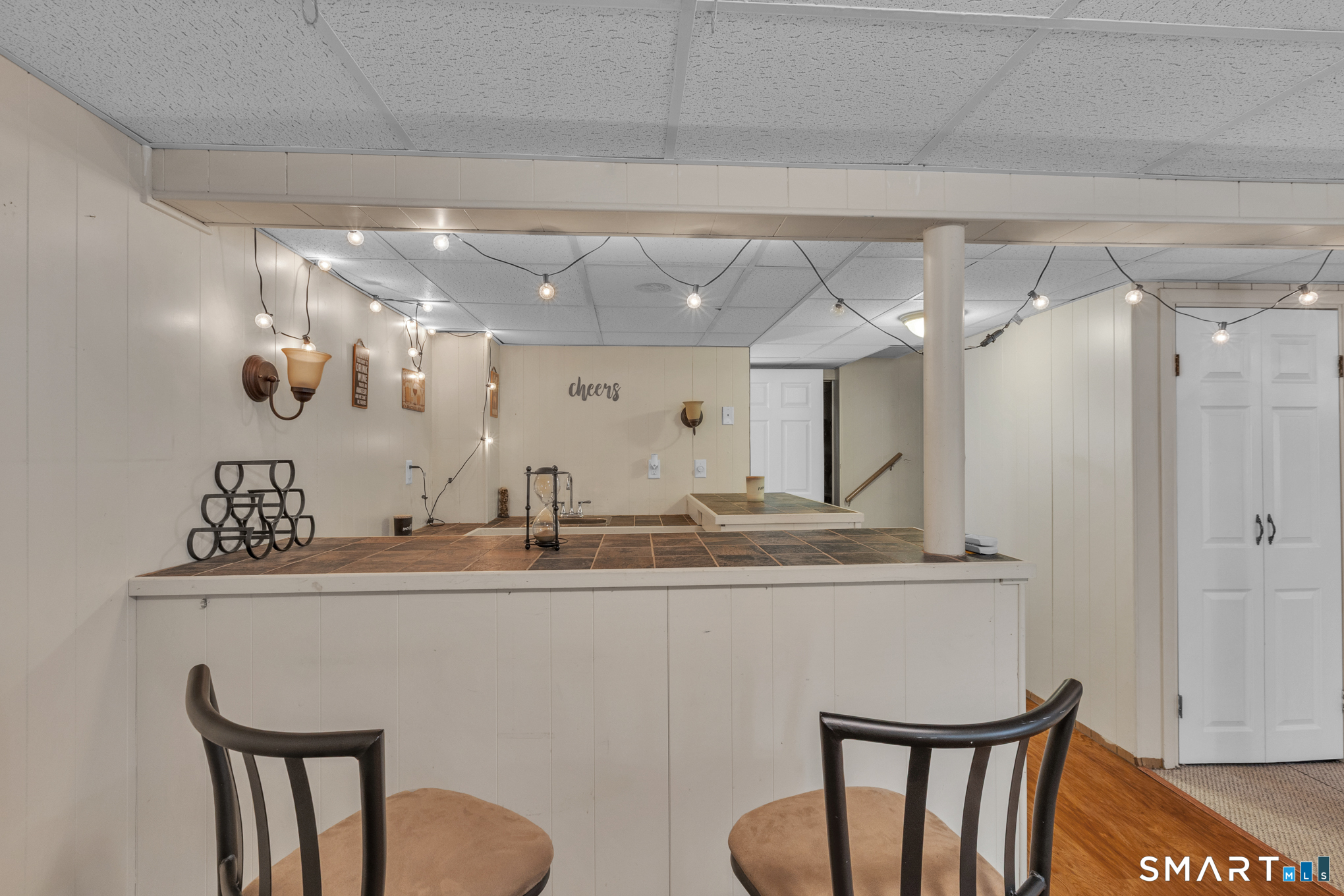 597 Wolcott Hill Road Wethersfield, CT 06109 - Photo 33 of 35 a kitchen with a table chairs stove and kitchen view