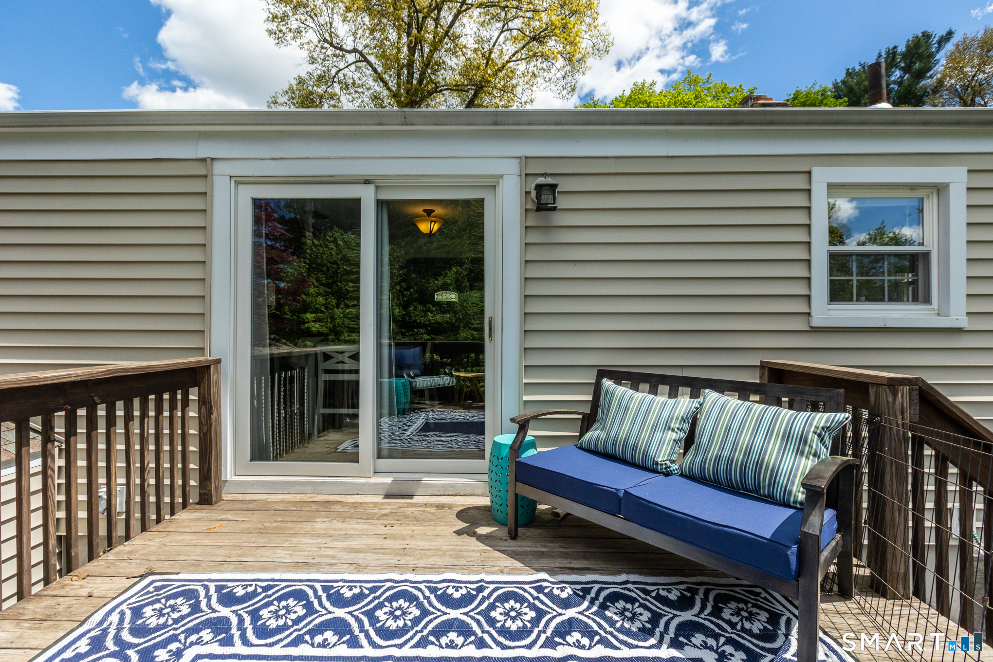 597 Wolcott Hill Road Wethersfield, CT 06109 - Photo 4 of 35 a view of a patio with a chairs