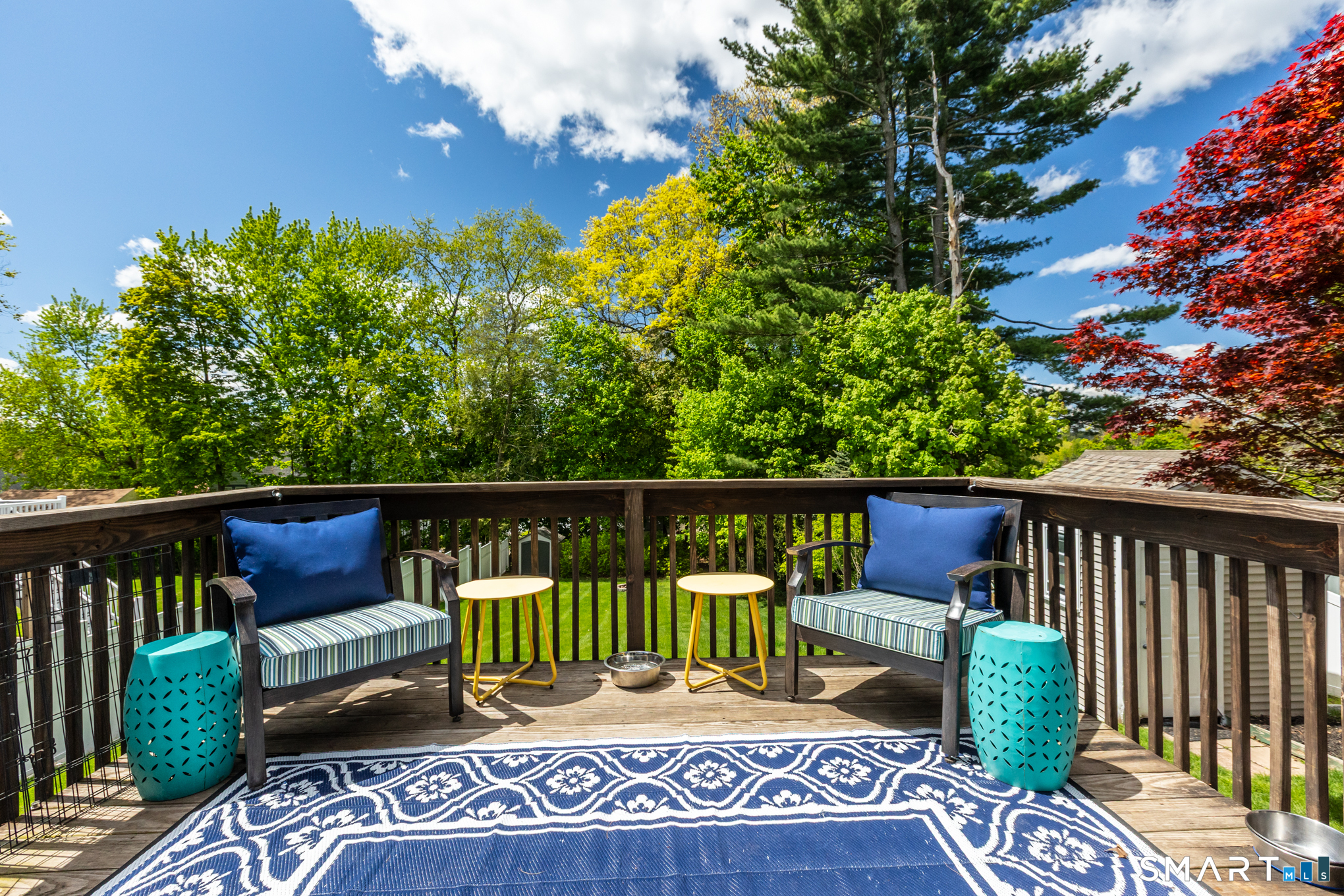 597 Wolcott Hill Road Wethersfield, CT 06109 - Photo 5 of 35 a view of a two chairs in the deck