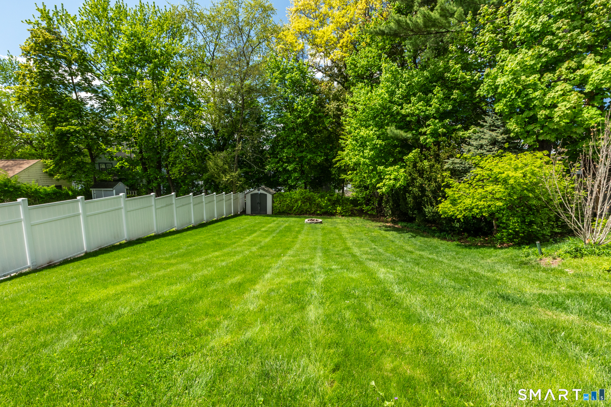 597 Wolcott Hill Road Wethersfield, CT 06109 - Photo 7 of 35 a view of a backyard