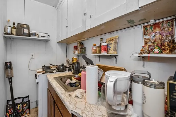 a room with storage and utility