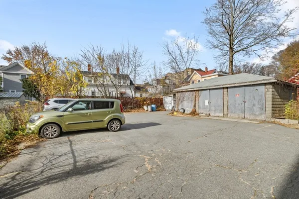 a view of parking space with truck parked
