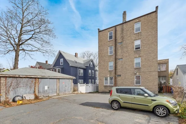 a car parked in front of a building