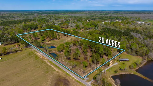 a view of a two chairs in the balcony
