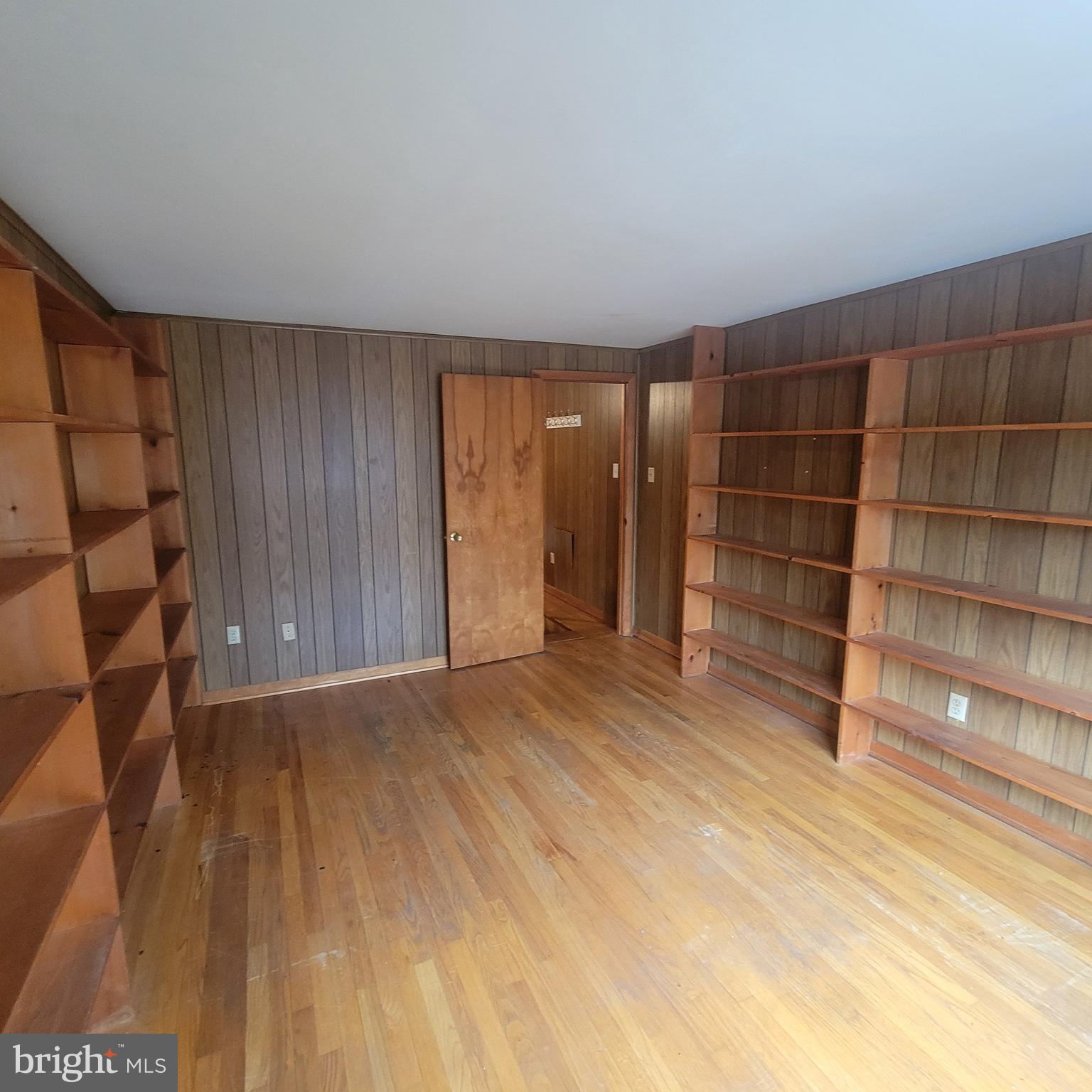 4227 Rupp Road Manchester, MD 21102 - Photo 22 of 31 a view of an empty room with wooden floor and closet