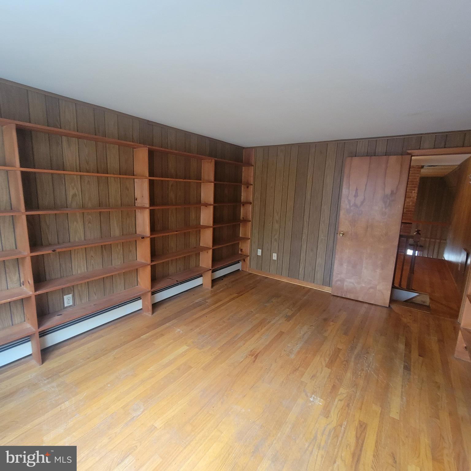 4227 Rupp Road Manchester, MD 21102 - Photo 23 of 31 a view of an empty room with wooden shelves