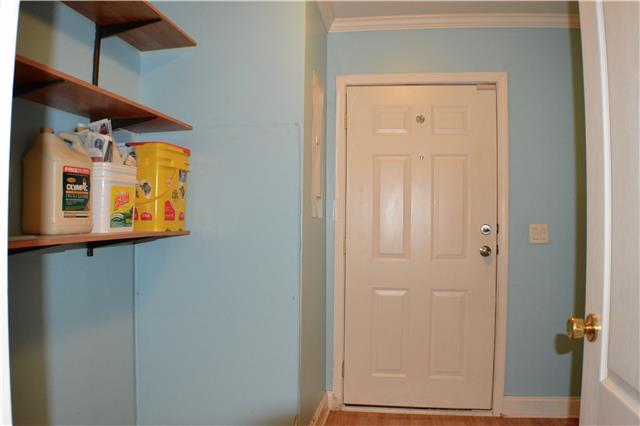 392 Joslin Branch Road White Bluff, TN 37187 - Photo 17 of 17 Laundry room has a lot of space for storage too.