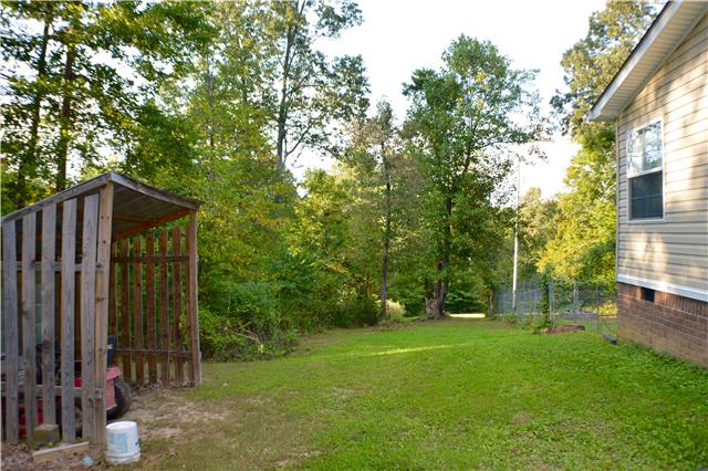 392 Joslin Branch Road White Bluff, TN 37187 - Photo 4 of 17 Small lean to great for storing lawn equipment.