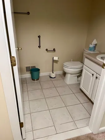 a bathroom with a sink and toilet