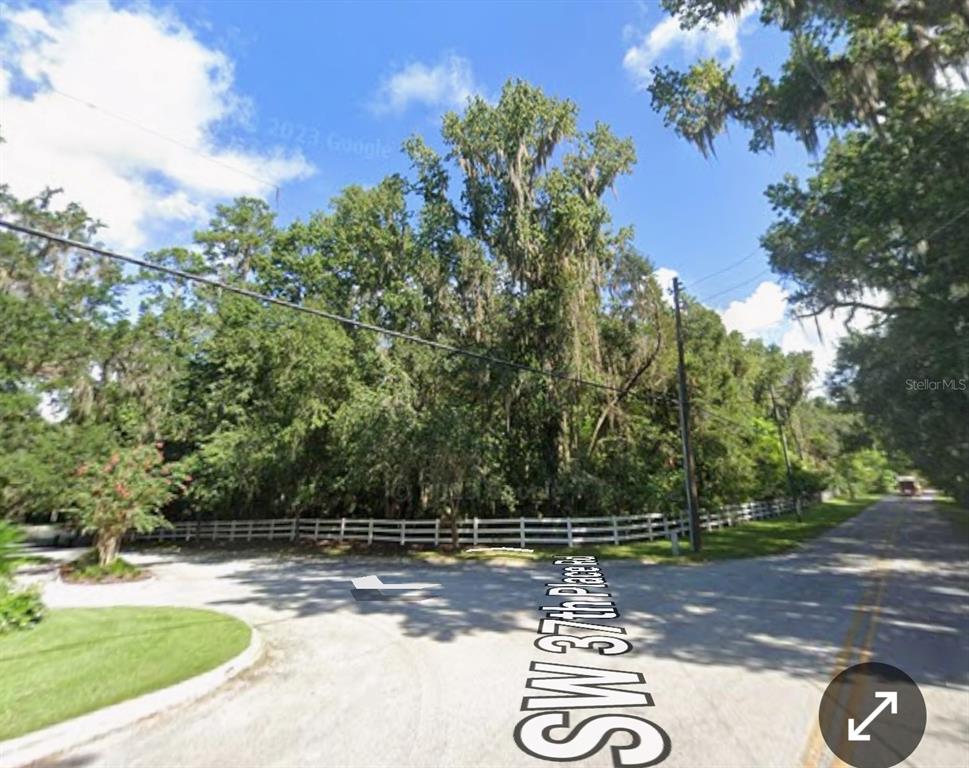 Tbd Southwest 37th Place Road Ocala, FL 34471 - Photo 8 of 11 a view of a fire pit with large trees