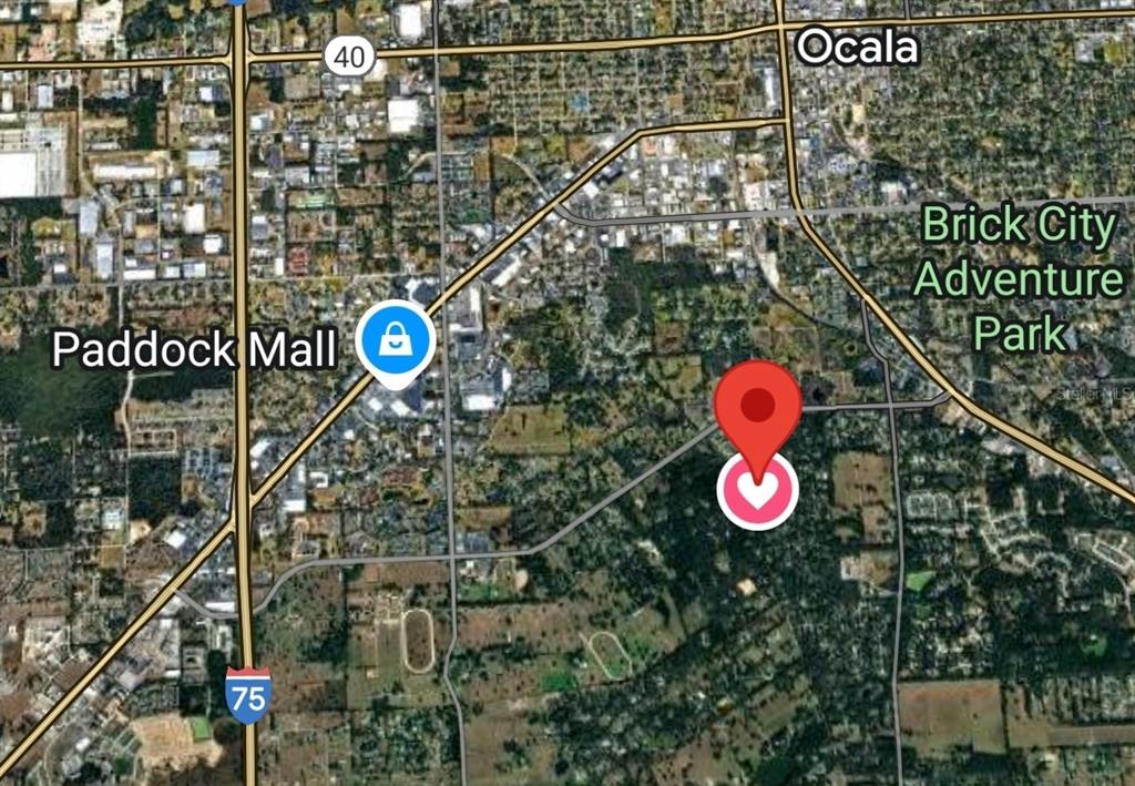 Tbd Southwest 37th Place Road Ocala, FL 34471 - Photo 10 of 11 a view of a street with lots of traffic signal lights