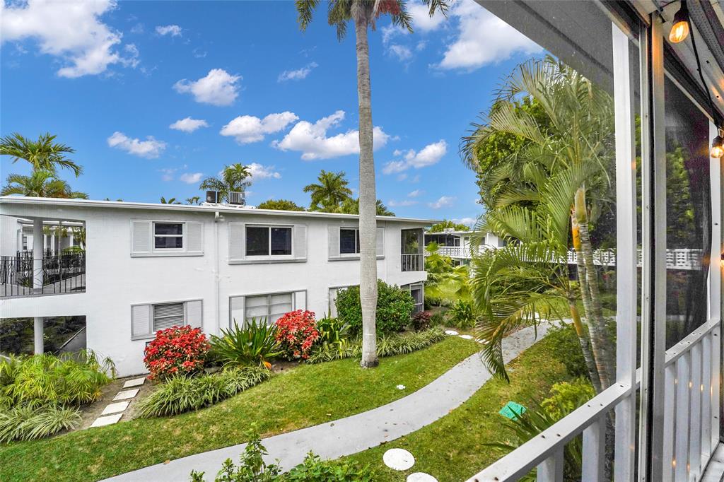 2161 Northeast 42nd Court, Unit 215 Lighthouse Point, FL 33064 - Photo 30 of 50 a picture of a yard