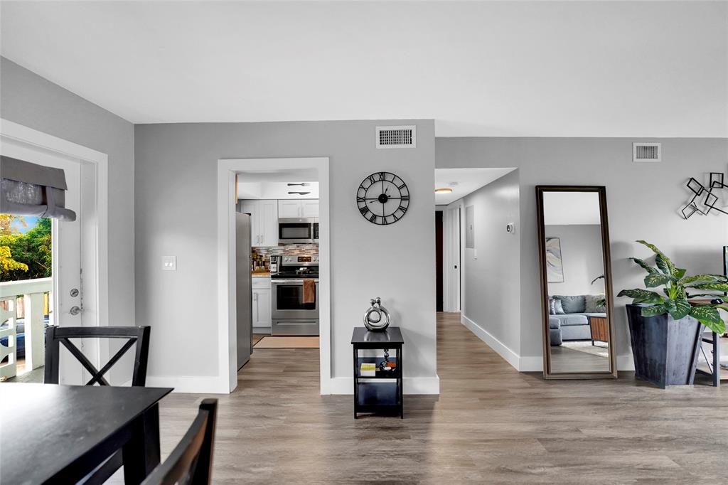 2161 Northeast 42nd Court, Unit 215 Lighthouse Point, FL 33064 - Photo 37 of 50 a view of a livingroom with furniture and a flat screen tv