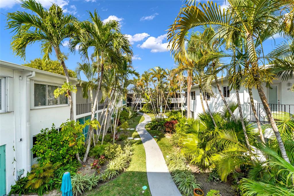 2161 Northeast 42nd Court, Unit 215 Lighthouse Point, FL 33064 - Photo 45 of 50 a view of a yard with plants