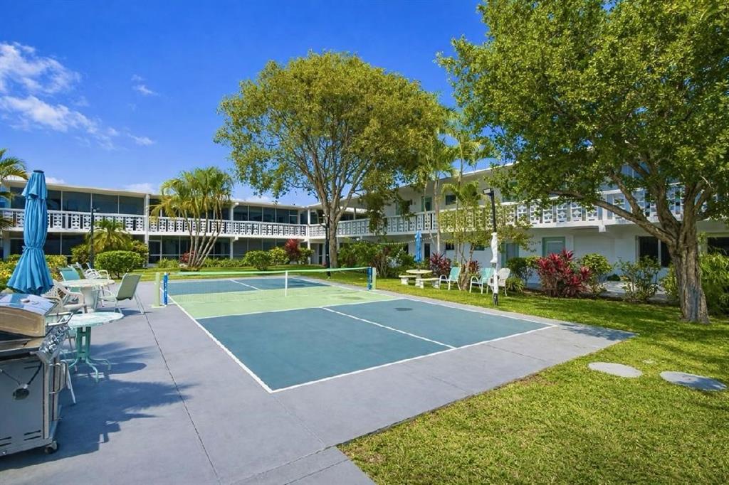 2161 Northeast 42nd Court, Unit 215 Lighthouse Point, FL 33064 - Photo 49 of 50 a view of a basketball court