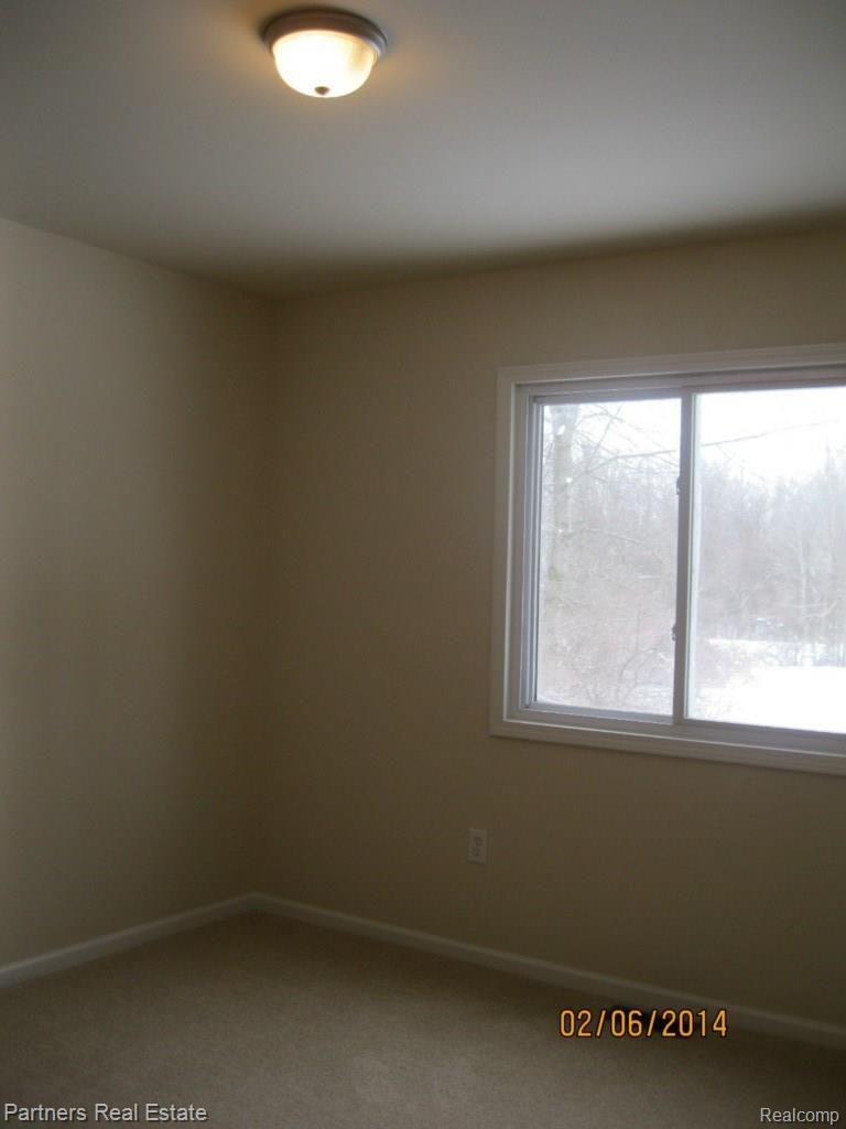 9201 West Allen Road Fowlerville, MI 48836 - Photo 7 of 11 Bedroom 3.jpg