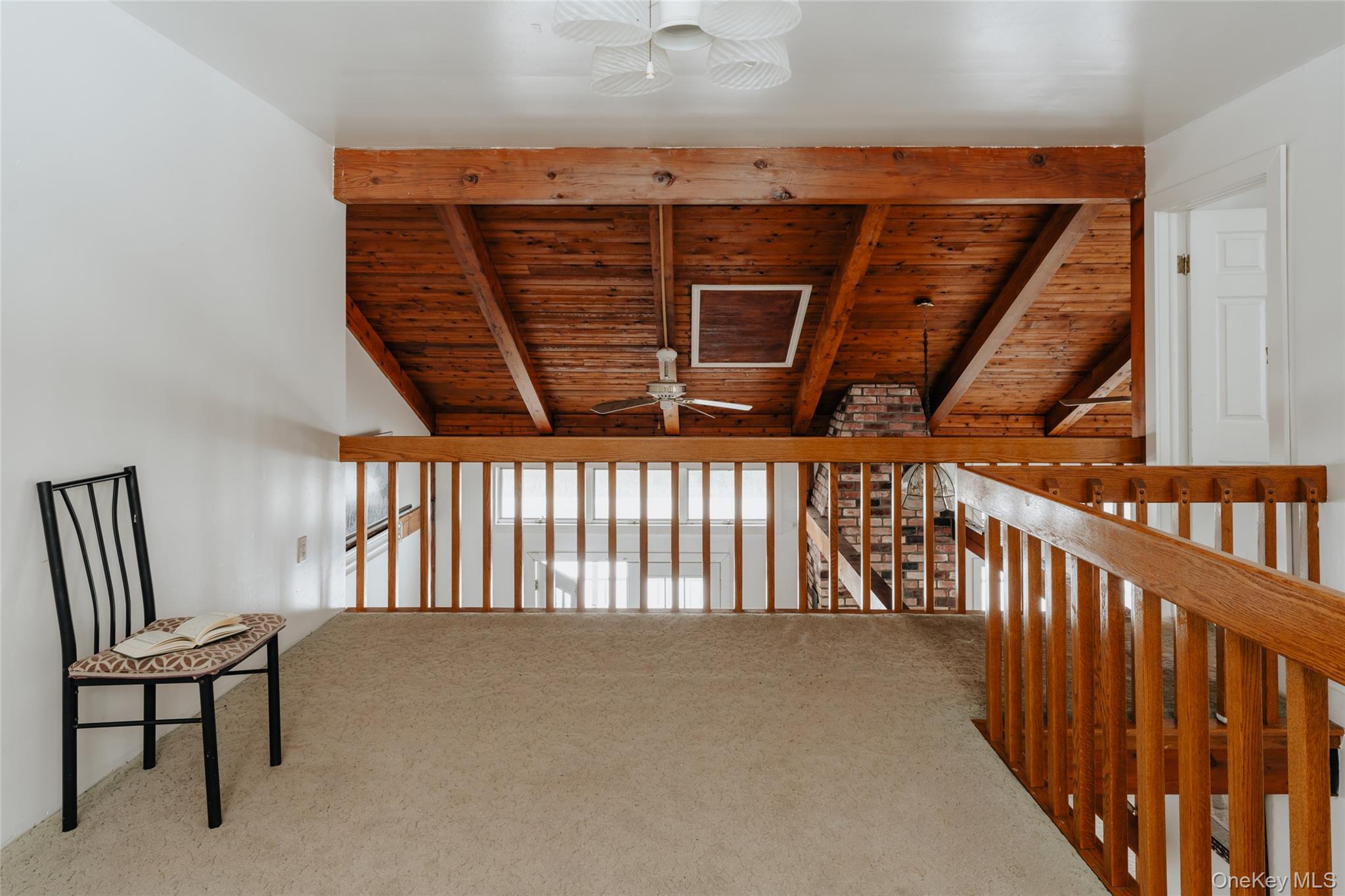 26 Beckys Hill Road Loch Sheldrake, NY 12759 - Photo 22 of 50 Unfurnished room with a ceiling fan, carpet flooring, and wooden ceiling