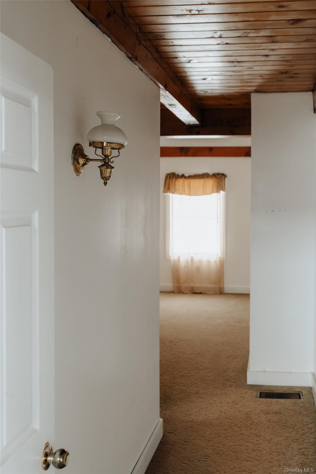 26 Beckys Hill Road Loch Sheldrake, NY 12759 - Photo 26 of 50 Hallway with carpet floors and wood ceiling