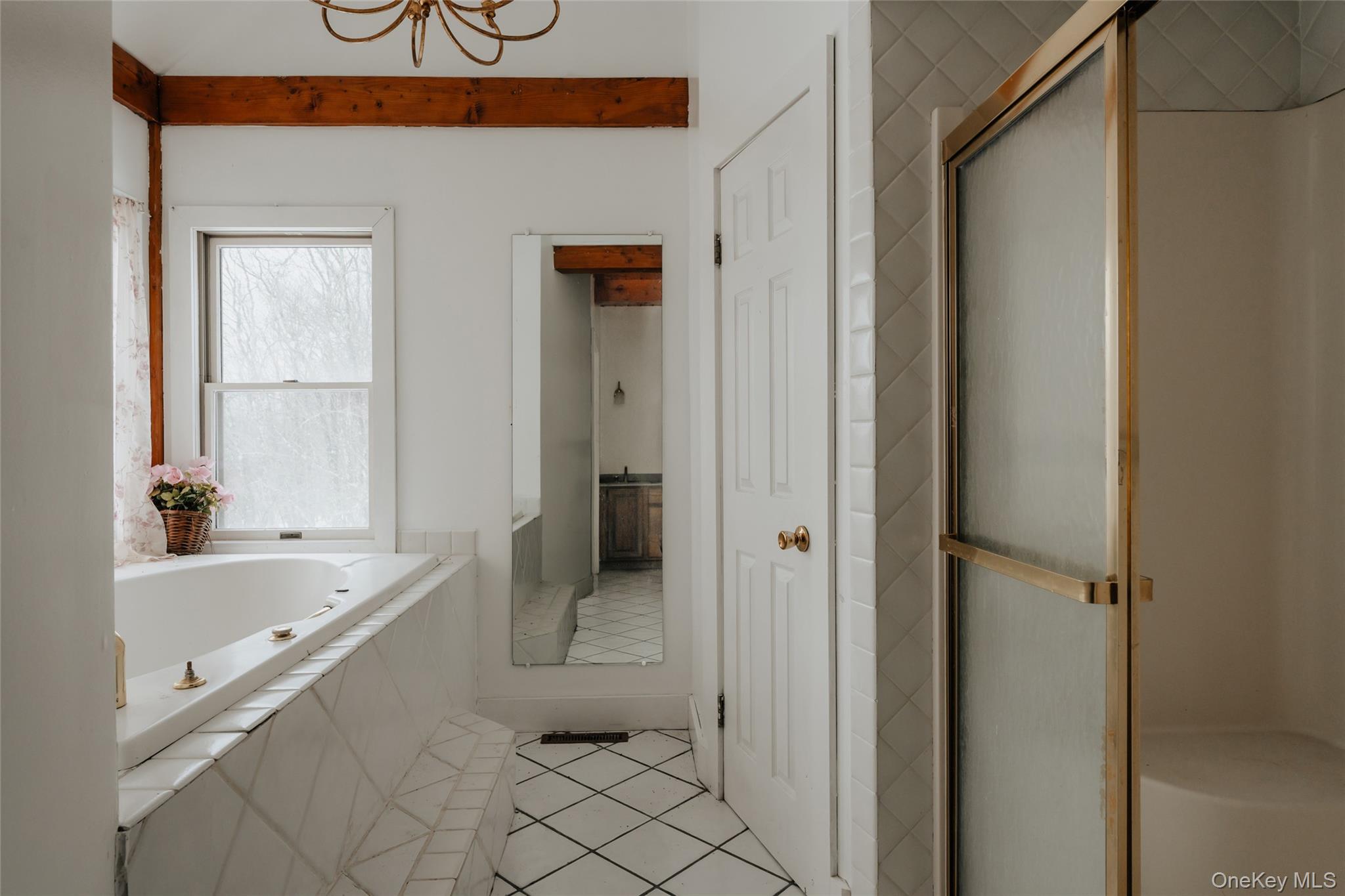 26 Beckys Hill Road Loch Sheldrake, NY 12759 - Photo 31 of 50 Full bathroom with a shower stall, light tile patterned floors, and a garden tub