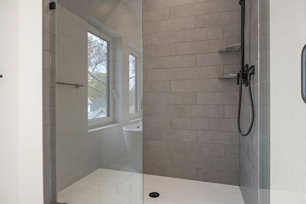 148 Myrtle Street, Unit 4 Melrose, MA 02176 - Photo 27 of 35 a bathroom with a shower