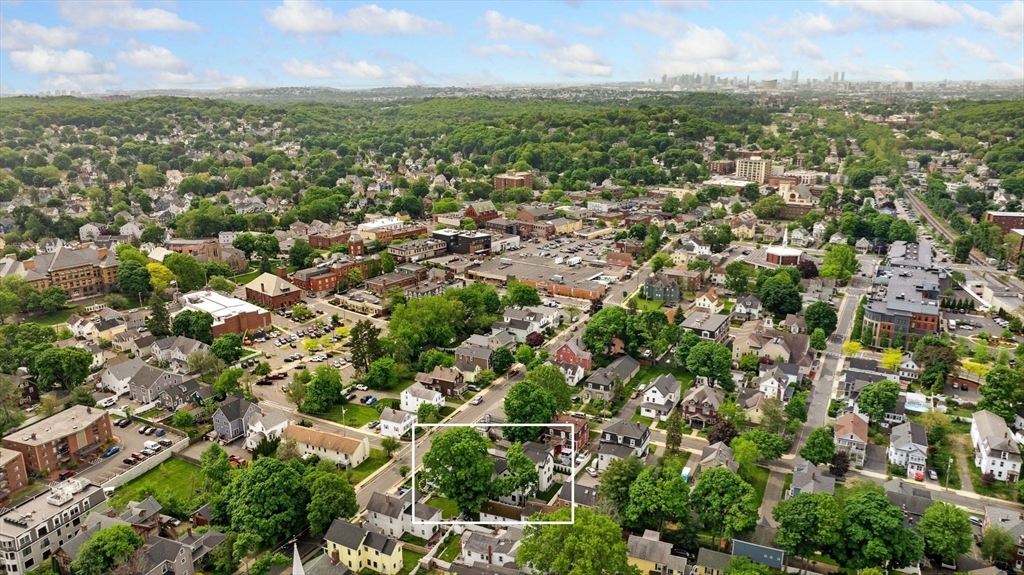148 Myrtle Street, Unit 4 Melrose, MA 02176 - Photo 35 of 35 an aerial view of residential houses with outdoor space and trees