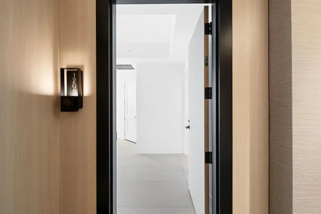 a bathroom with a shower and a bath tub