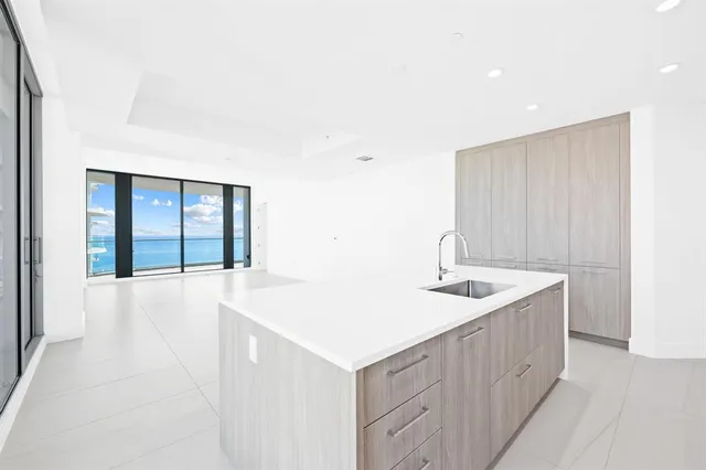 a bathroom with a sink a toilet and a bathtub