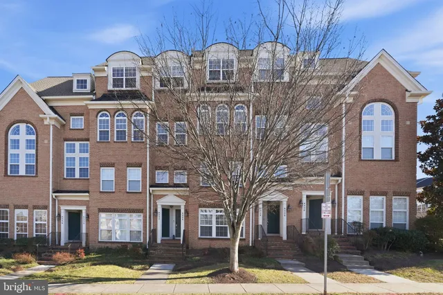 a front view of a building with garden
