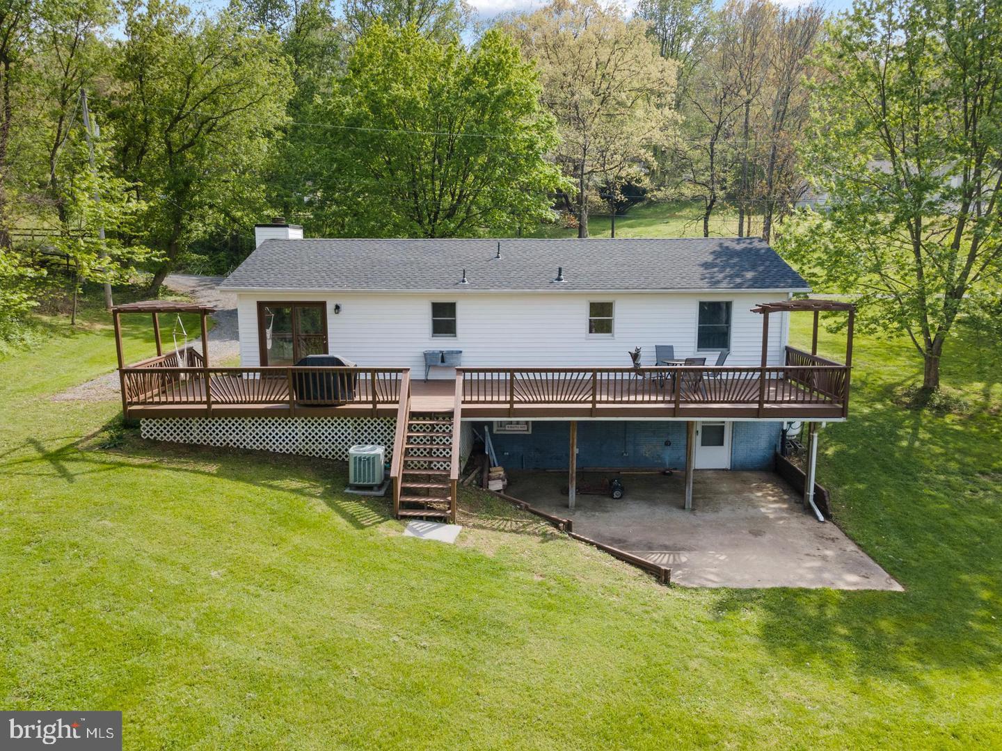 50 Remount View Road Front Royal, VA 22630 - Photo 43 of 44 front view of a house with swimming pool and sitting area