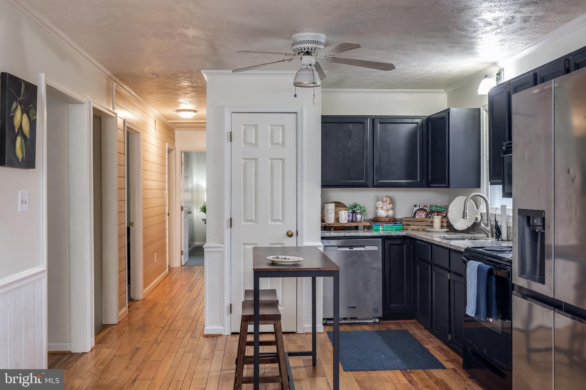 50 Remount View Road Front Royal, VA 22630 - Photo 8 of 44 a kitchen with granite countertop a stove and a refrigerator
