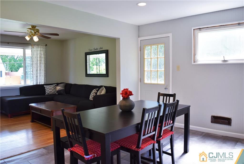 24 North Pennington Road New Brunswick, NJ 08901 - Photo 14 of 47 a view of a dining room with furniture and wooden floor