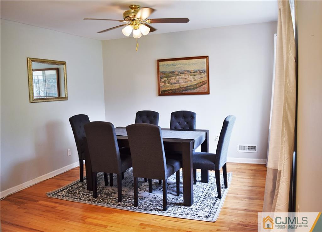 24 North Pennington Road New Brunswick, NJ 08901 - Photo 17 of 47 a view of a dining room with furniture