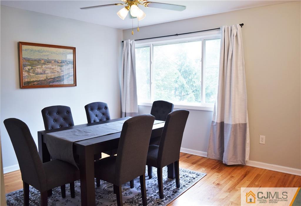 24 North Pennington Road New Brunswick, NJ 08901 - Photo 18 of 47 a view of a dining room with furniture window and wooden floor