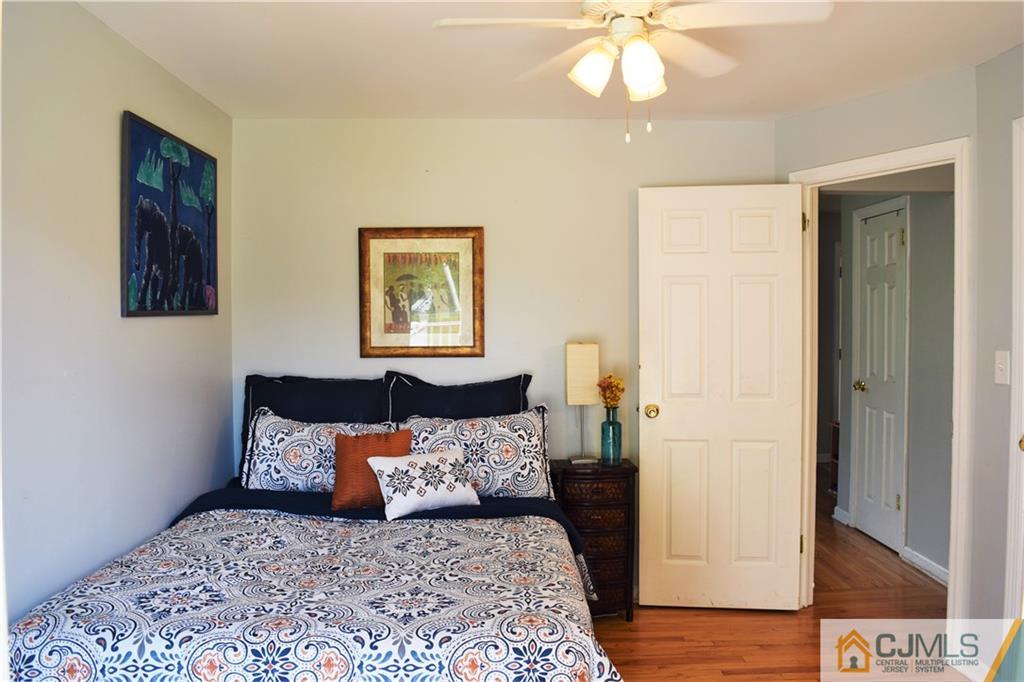 24 North Pennington Road New Brunswick, NJ 08901 - Photo 23 of 47 a bedroom with a bed and a window