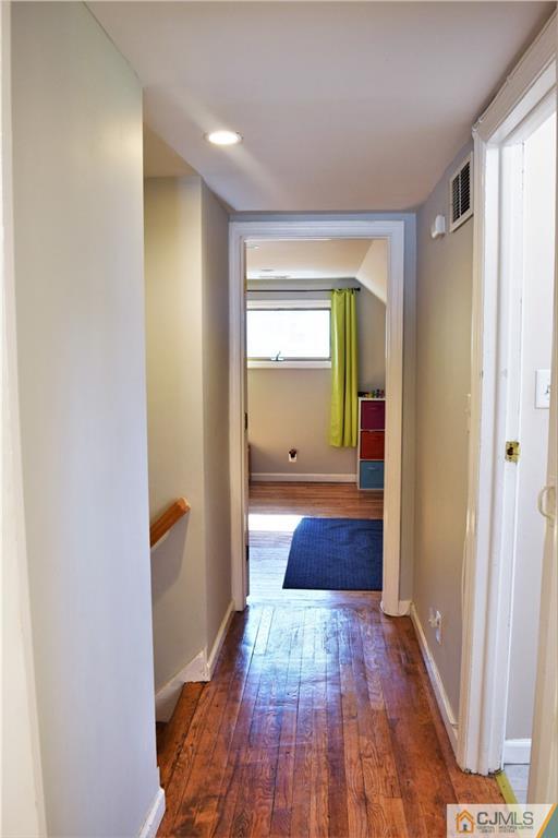 24 North Pennington Road New Brunswick, NJ 08901 - Photo 26 of 47 a view of hallway with wooden floor