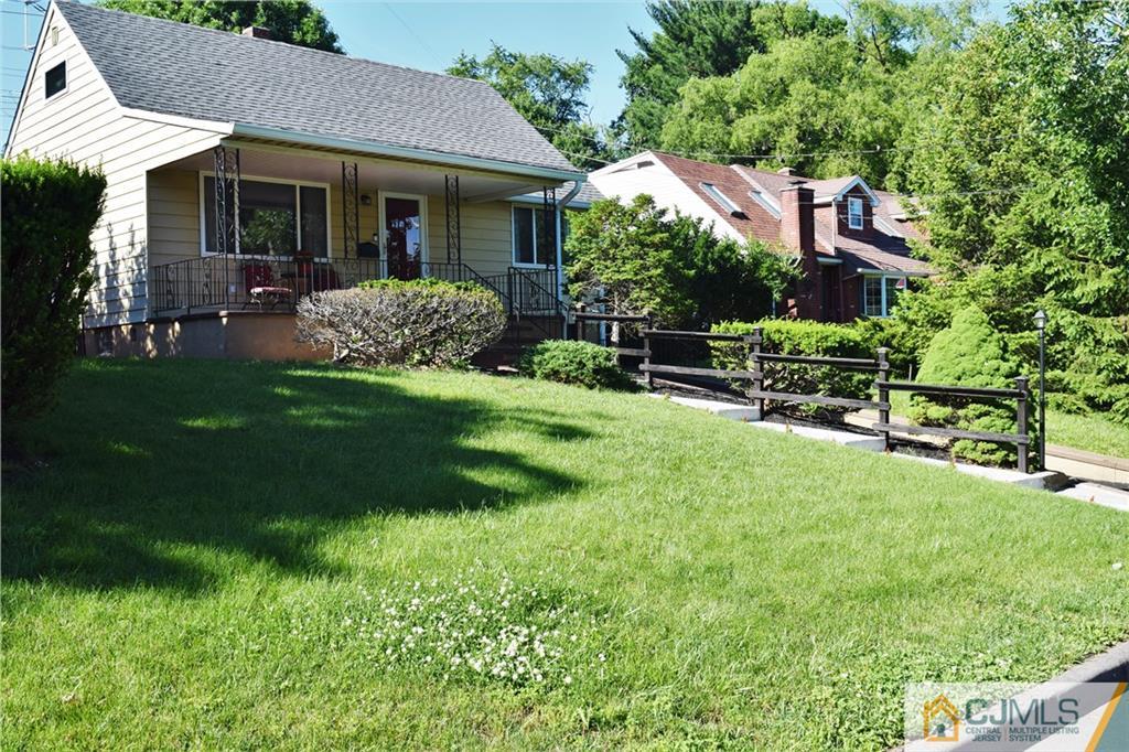 24 North Pennington Road New Brunswick, NJ 08901 - Photo 4 of 47 a front view of house with yard and green space