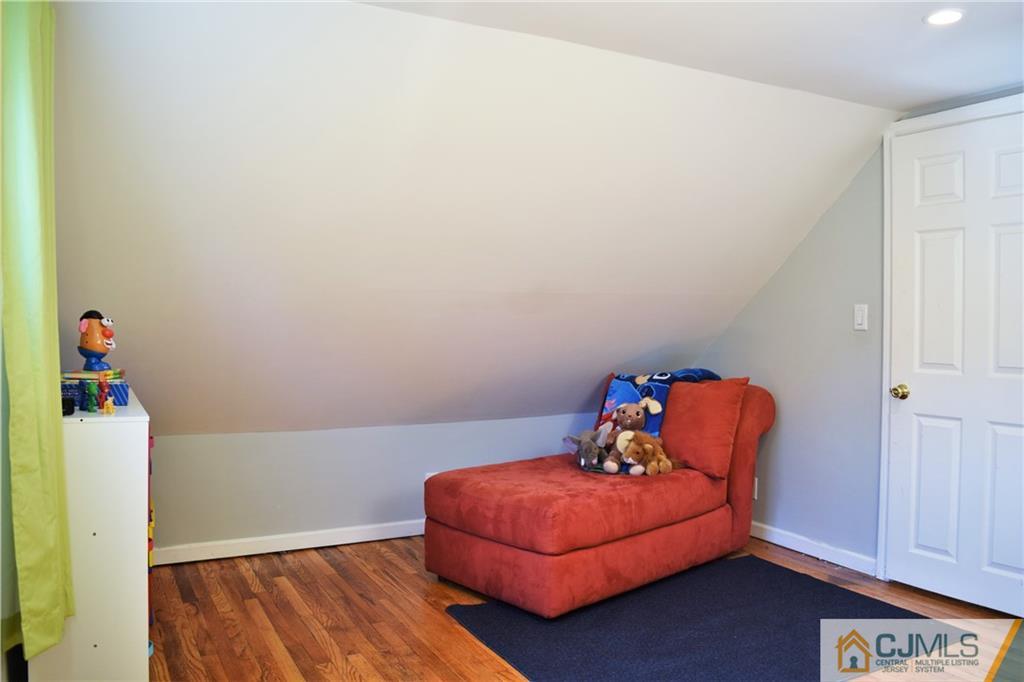 24 North Pennington Road New Brunswick, NJ 08901 - Photo 32 of 47 a bedroom with a bed and a window