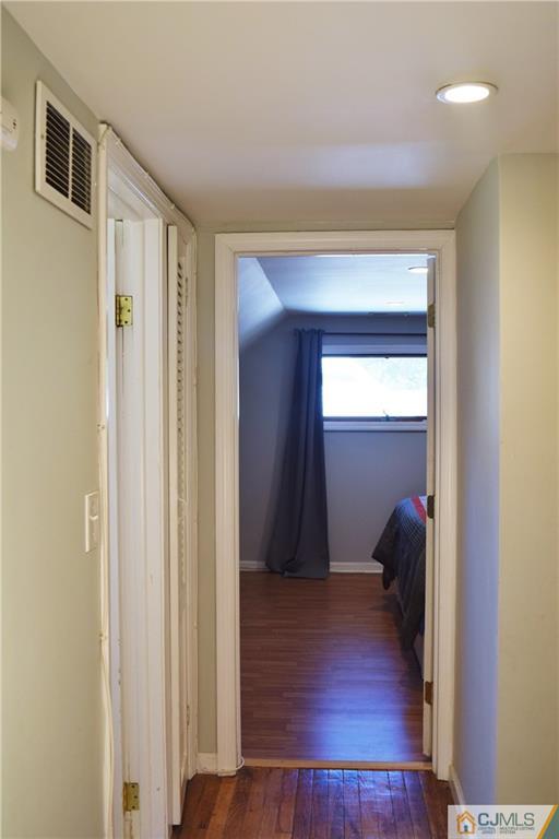 24 North Pennington Road New Brunswick, NJ 08901 - Photo 33 of 47 a view of a room with wooden floor and closet