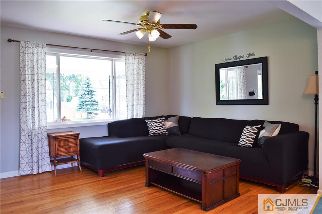 24 North Pennington Road New Brunswick, NJ 08901 - Photo 8 of 47 a living room with furniture and a window
