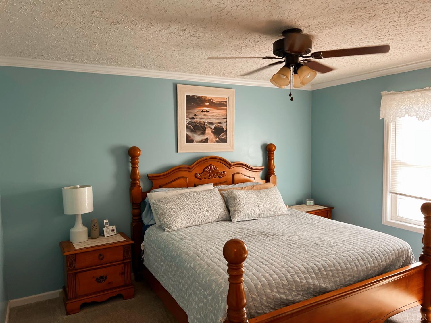 1009 Fall Creek Road Ringgold, VA 24586 - Photo 15 of 58 a bedroom with bed and window