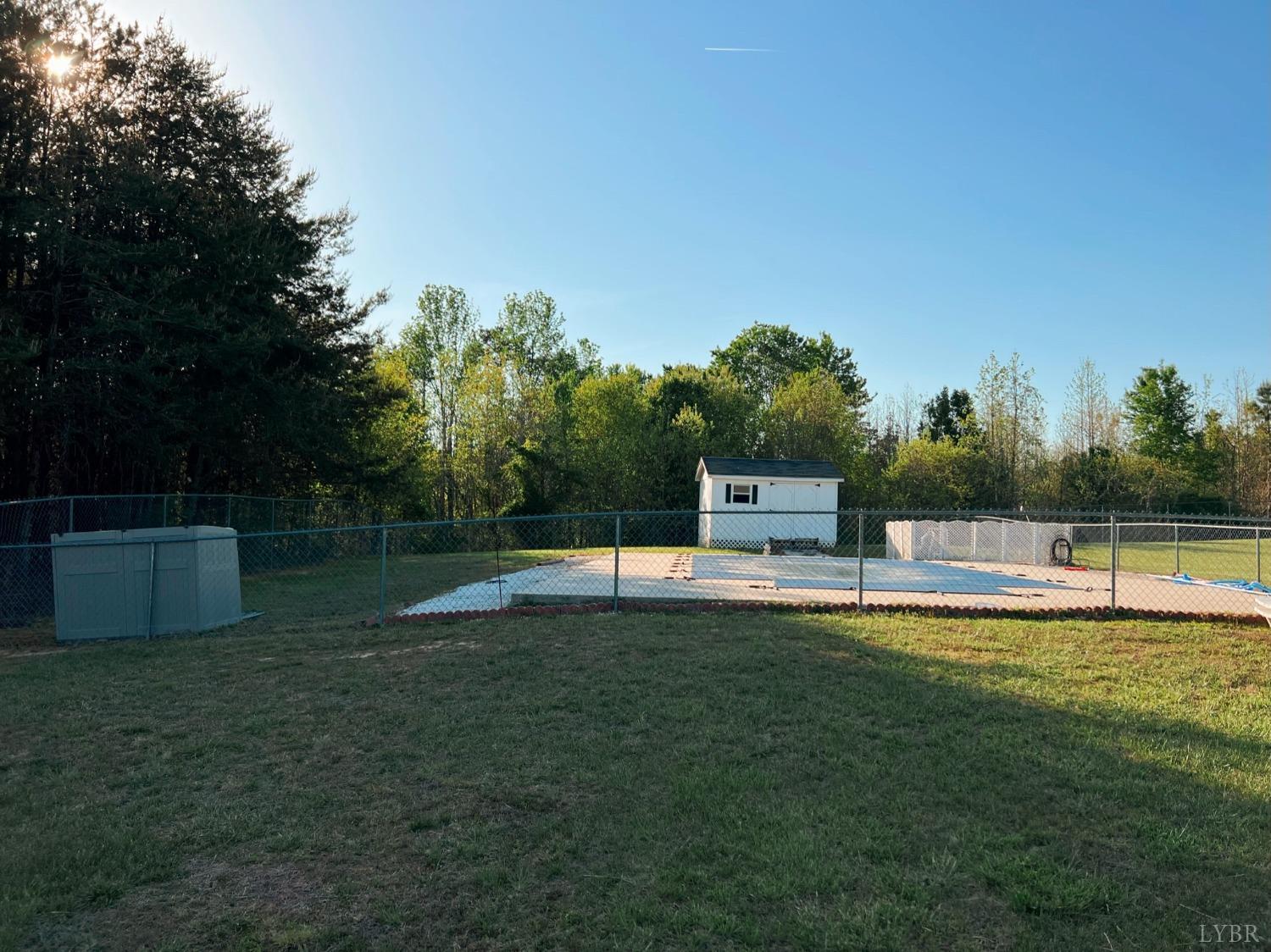 1009 Fall Creek Road Ringgold, VA 24586 - Photo 42 of 58 a swimming pool with wooden fence