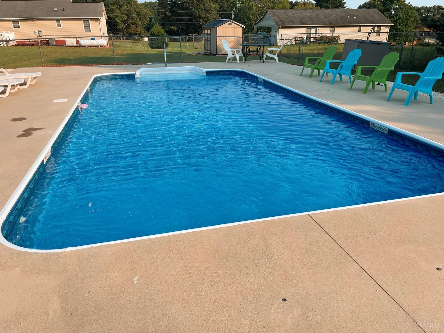 1009 Fall Creek Road Ringgold, VA 24586 - Photo 50 of 58 a view of a swimming pool and an outdoor space