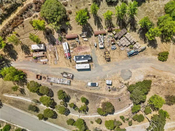 a view of a forest with a building