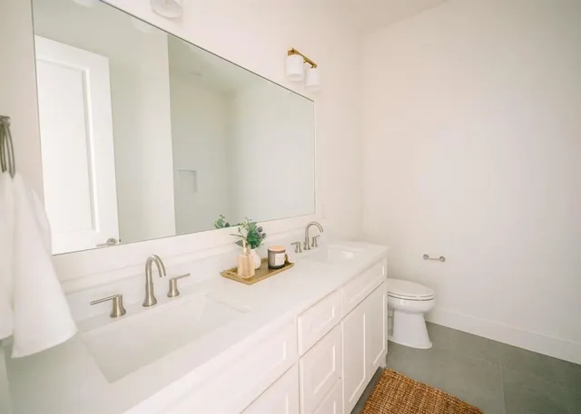 a bathroom with a sink and a toilet