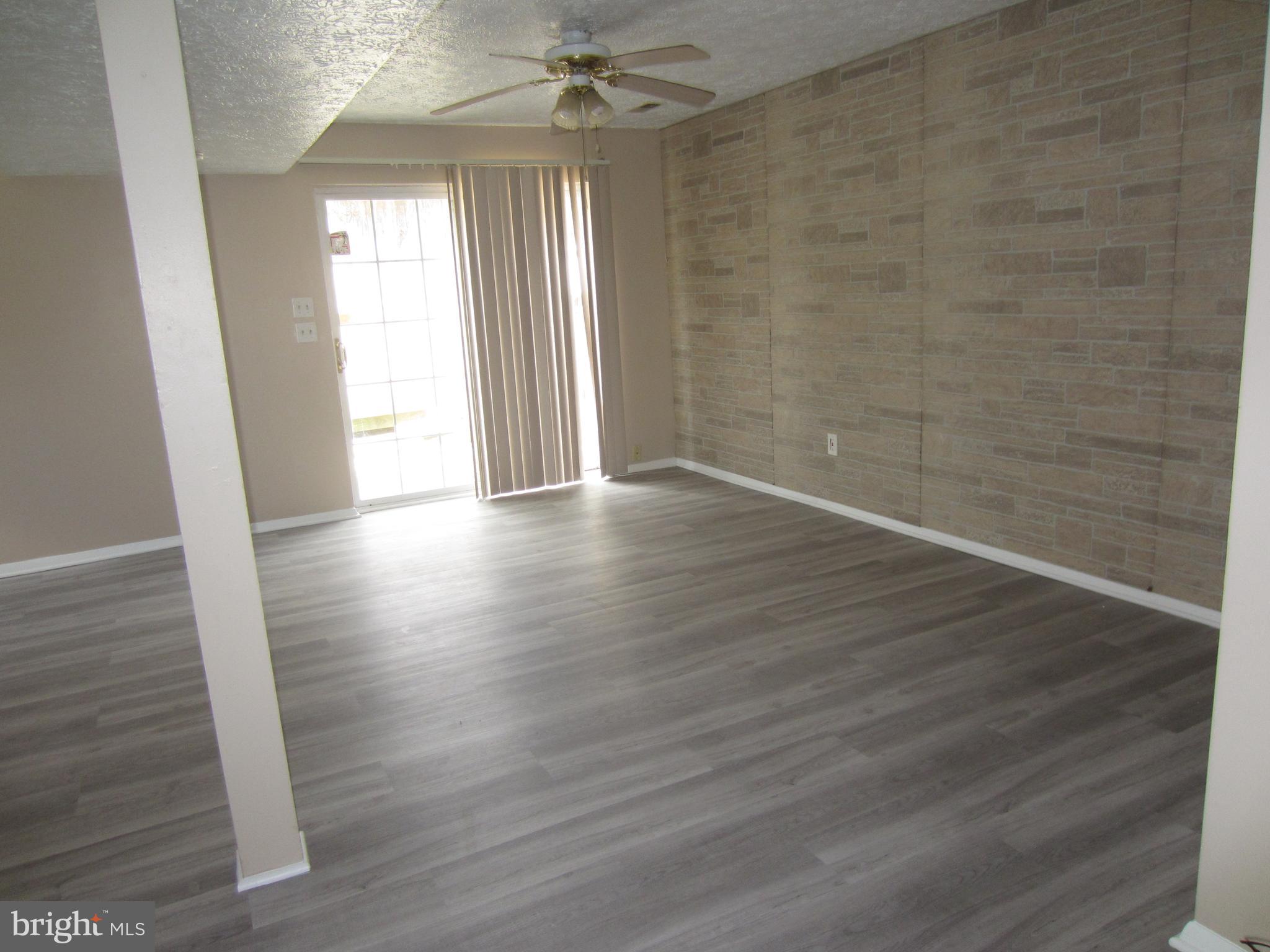 119 Bar Harbor Road Pasadena, MD 21122 - Photo 18 of 29 lower level family room with outside access